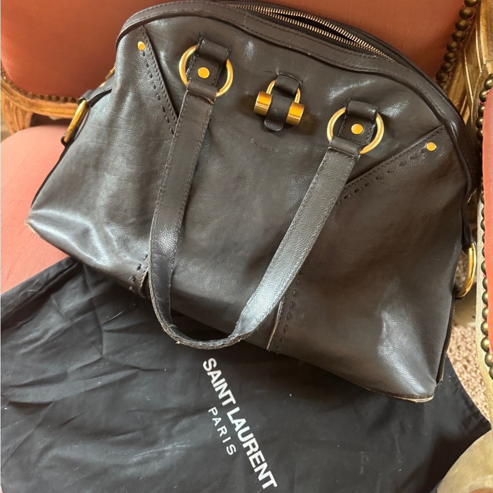 YSL Yves Saint Laurent “Muse Bowler” bag.